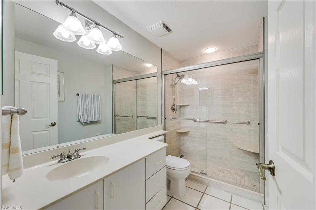 GUEST BATH WITH REMODELED SHOWER AND VANITY