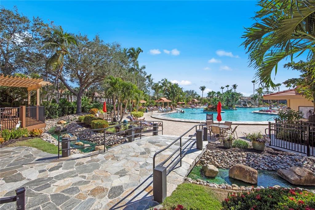STONE PATH FROM THE DECK LEADING TO THE POOL