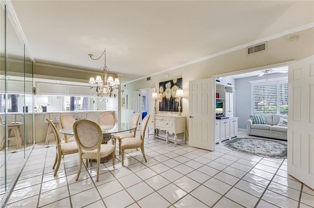 DINING AREA WITH MIDDLE BEDROOM TO THE RIGHT