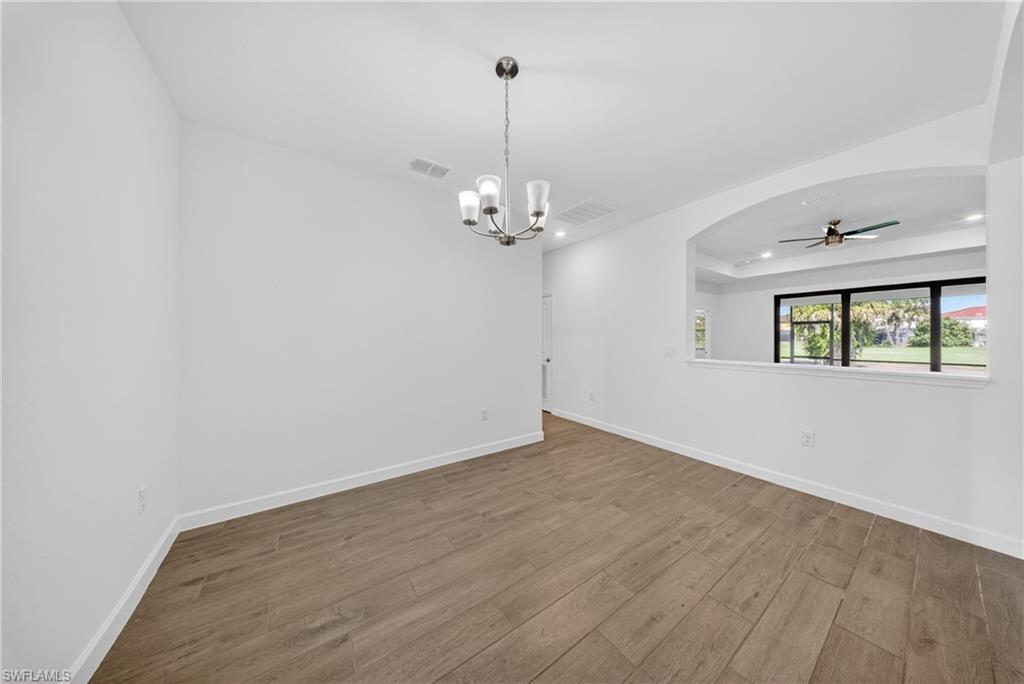 Neutral color palette with wood-finish flooring