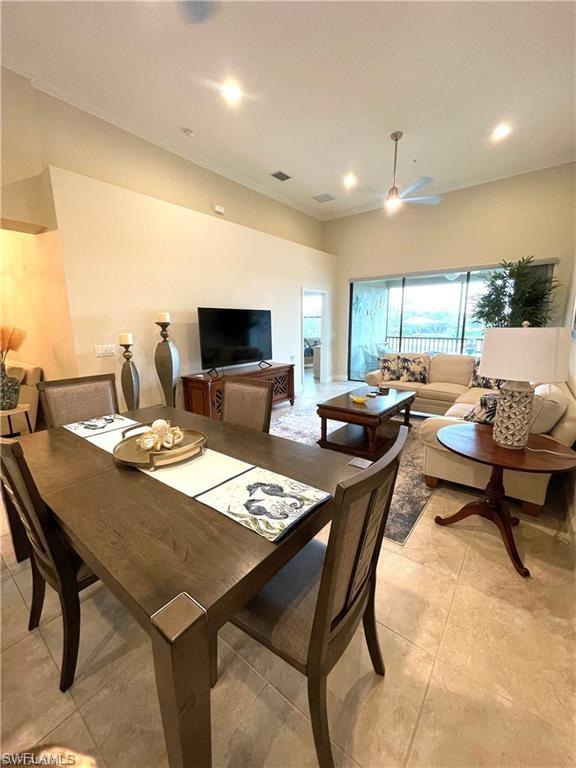 Dining area featuring recessed lighting and visible vents