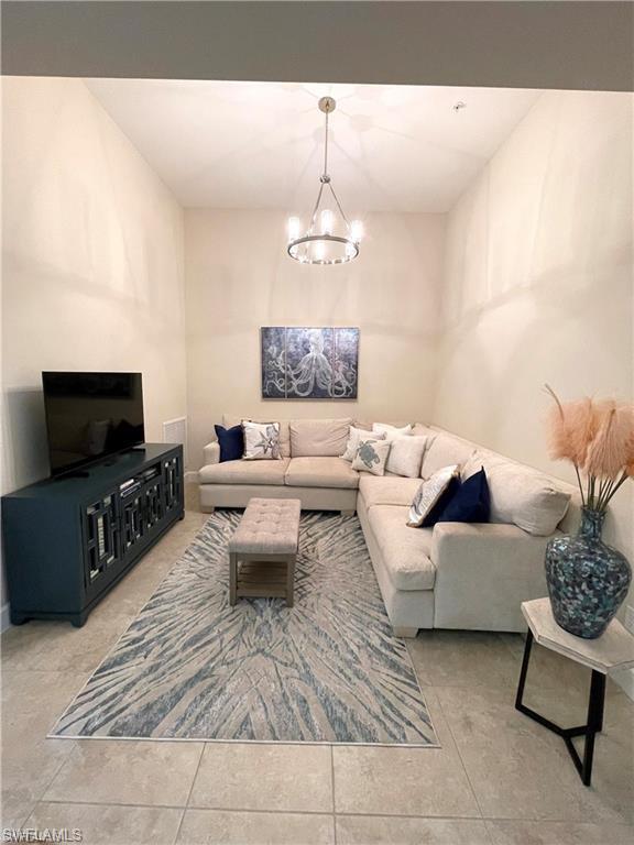 Living room with a notable chandelier