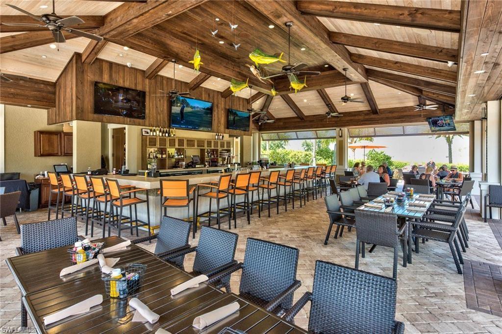 Dining room with wood ceiling, high vaulted ceiling, beamed ceiling, and a ceiling fan