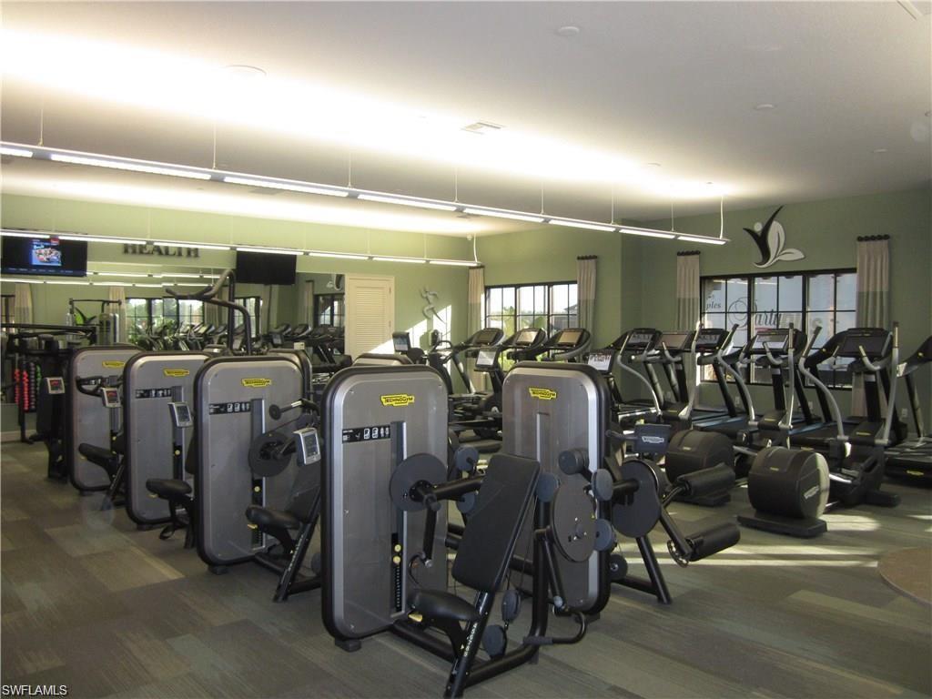 Gym featuring carpet flooring