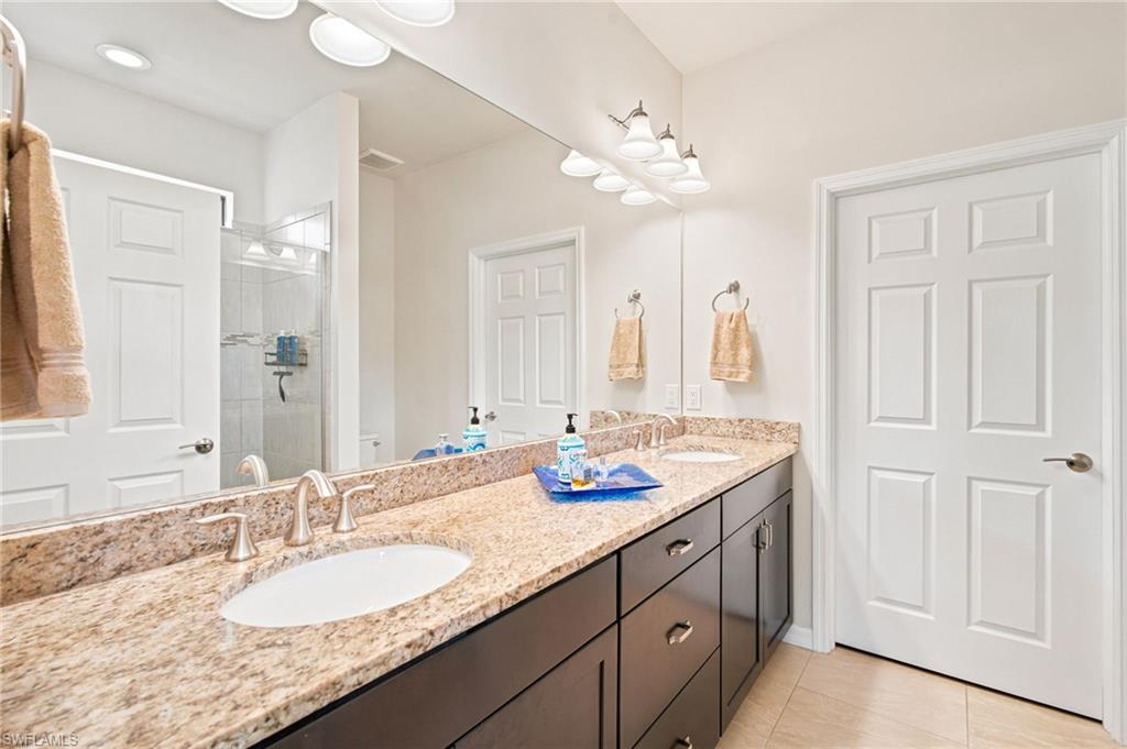 Master Bath with dual sinks and granite countertop