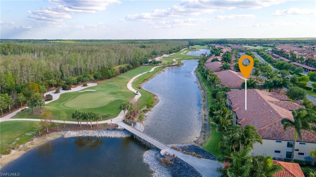 Bird's eye view of a nearby body of water and a local golf course