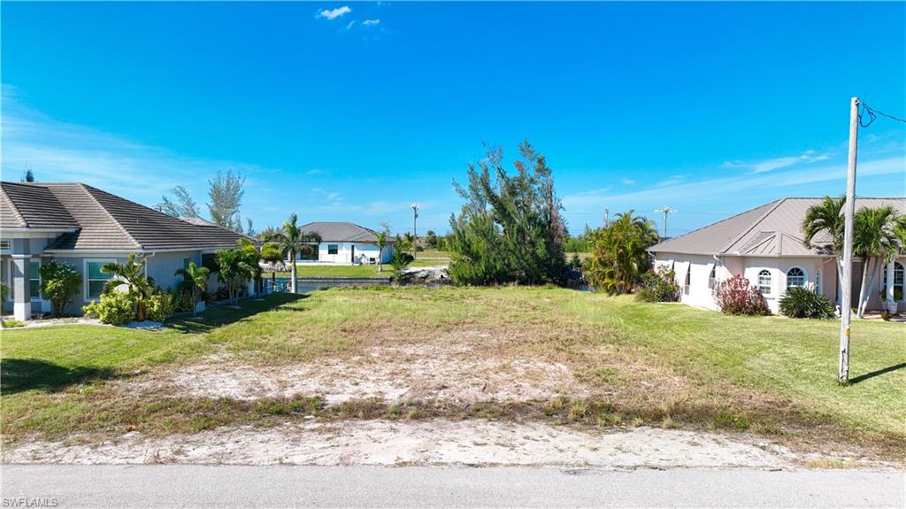 Expansive residential lot featuring a flat, cleared building area