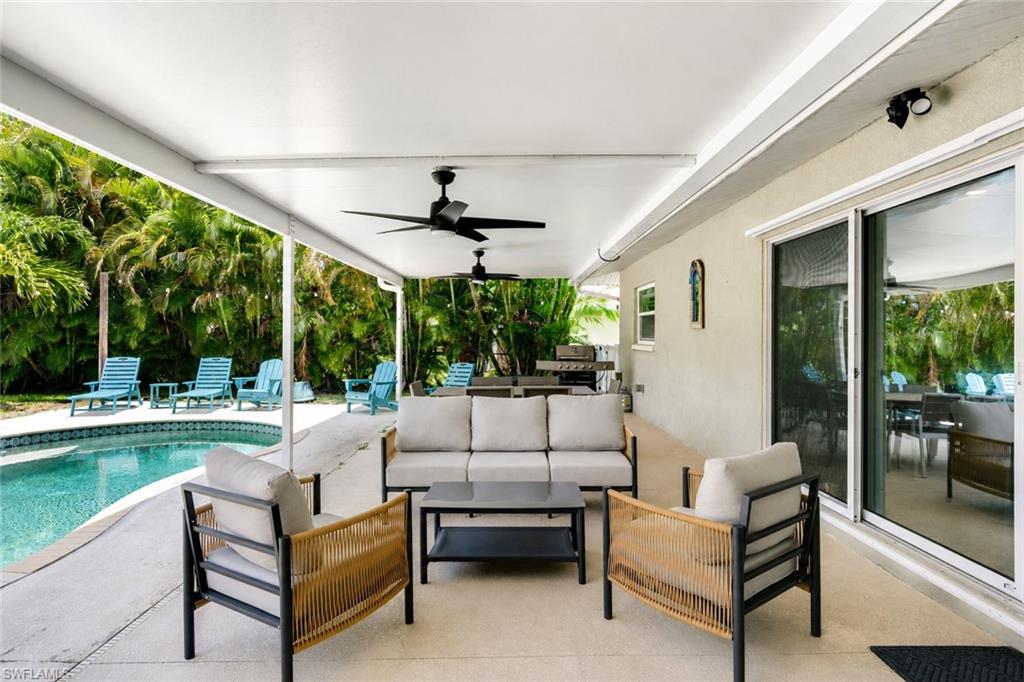 Covered waterfront lanai for year-round entertaining