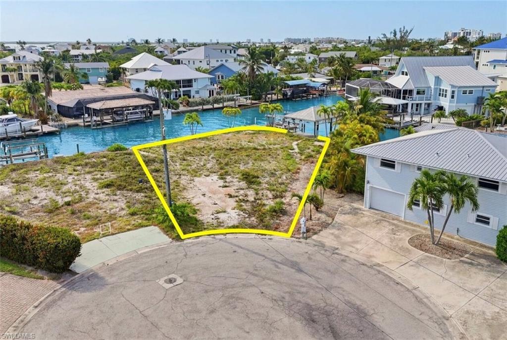 Vacant waterfront lot with direct canal access - Virtually Edited Image