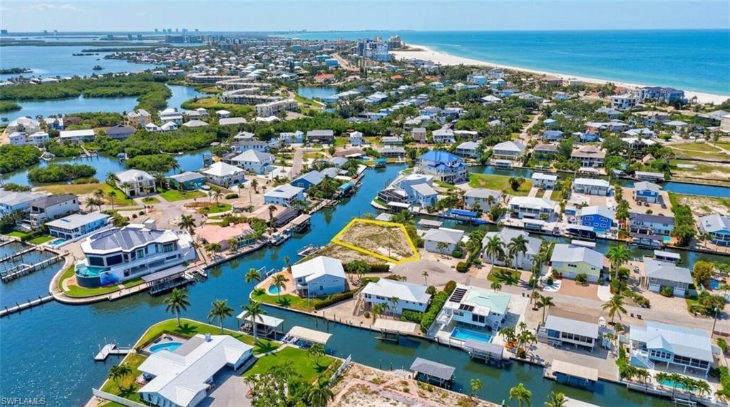 Vacant land parcel situated within a coastal residential area - Virtually Edited Image