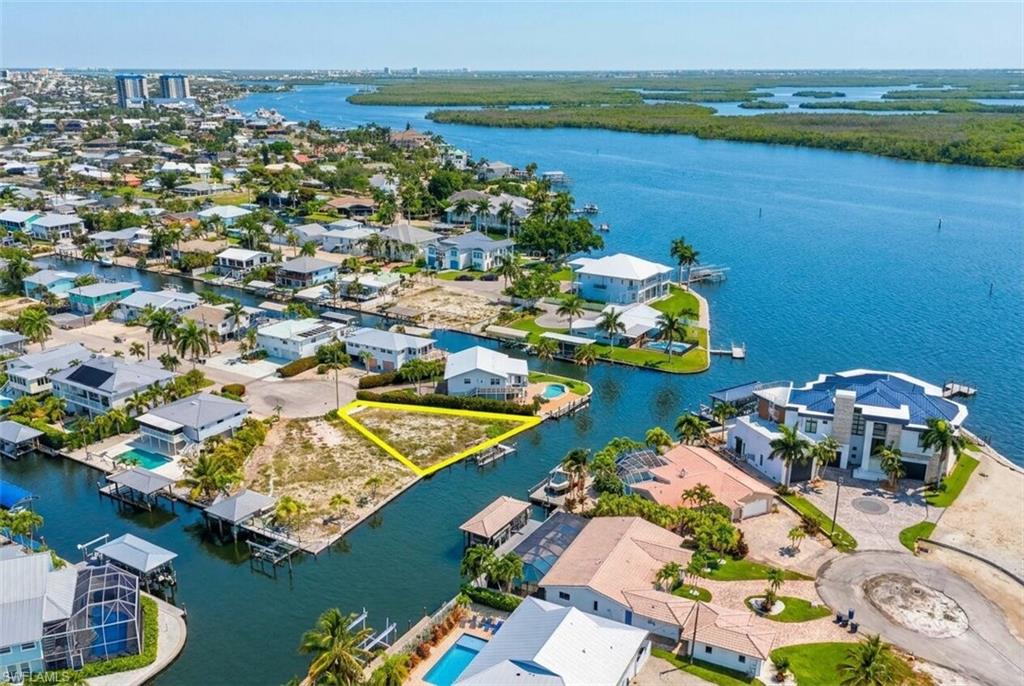 Vacant waterfront lot with direct canal access - Virtually Edited Image