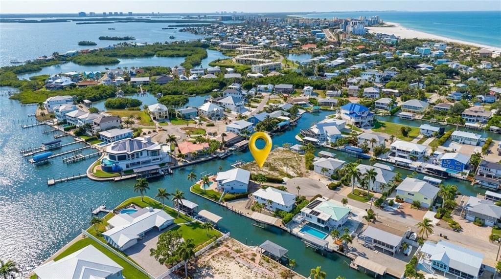 Waterfront property with direct canal access, featuring a large lot and proximity to the Gulf of Mexico shoreline - Virtually Edited Image