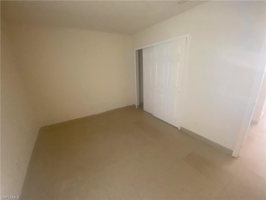 Neutral tone painted walls complement the light-toned tile flooring