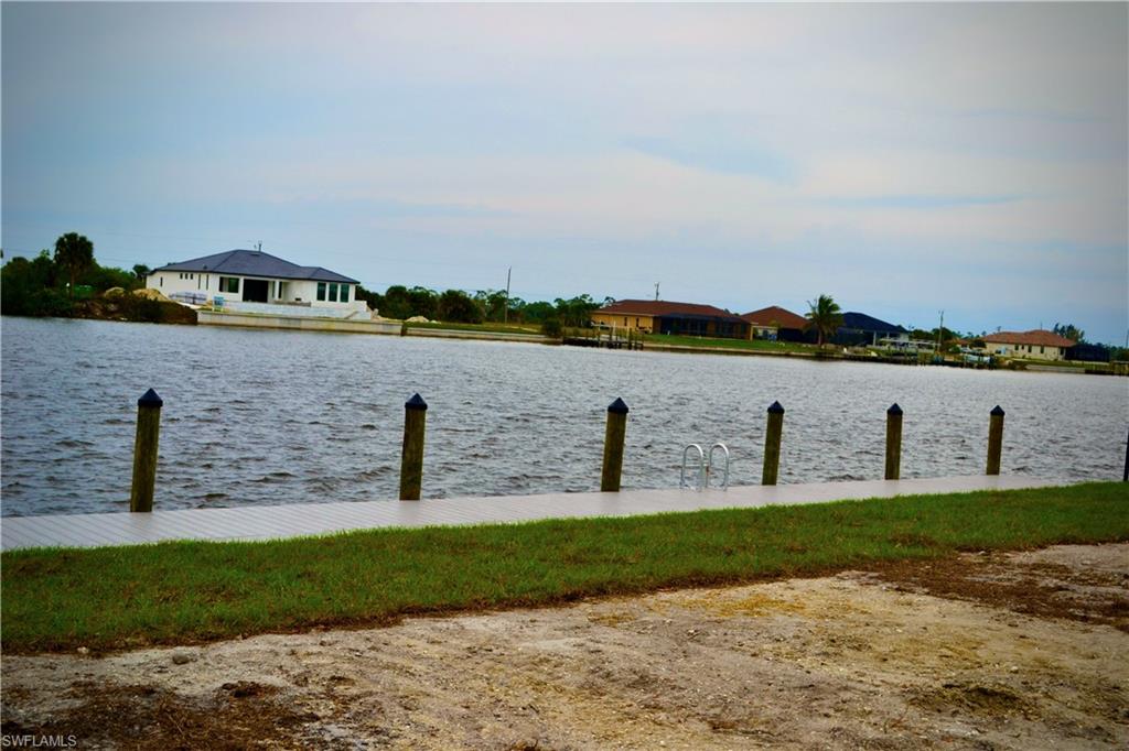 Water view with a boat dock