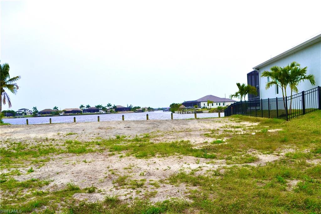 View of yard with a water view