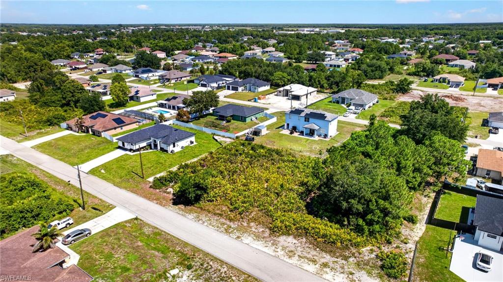 Expansive vacant lot featuring natural vegetation