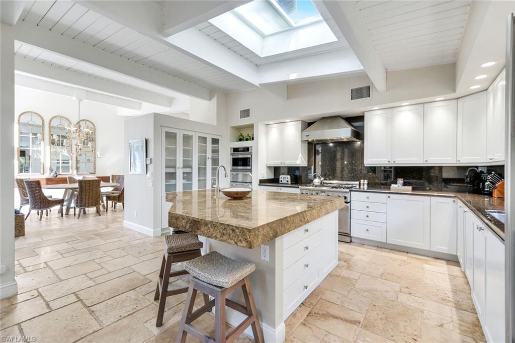 open to dining area, family room and patio