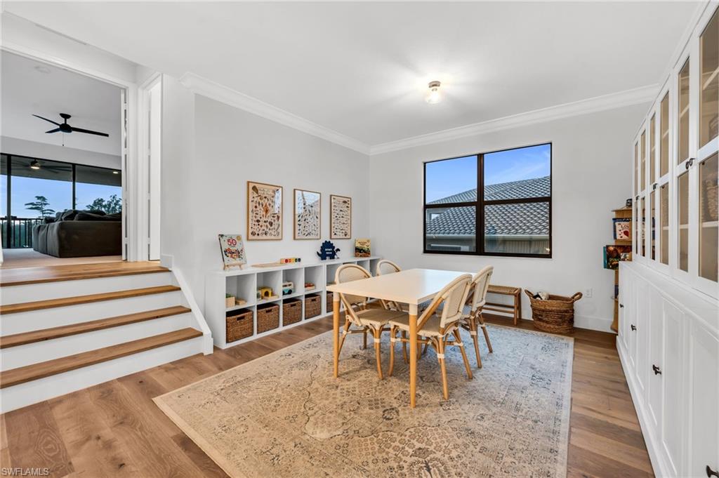 Wood-finish flooring throughout and built in cabinets