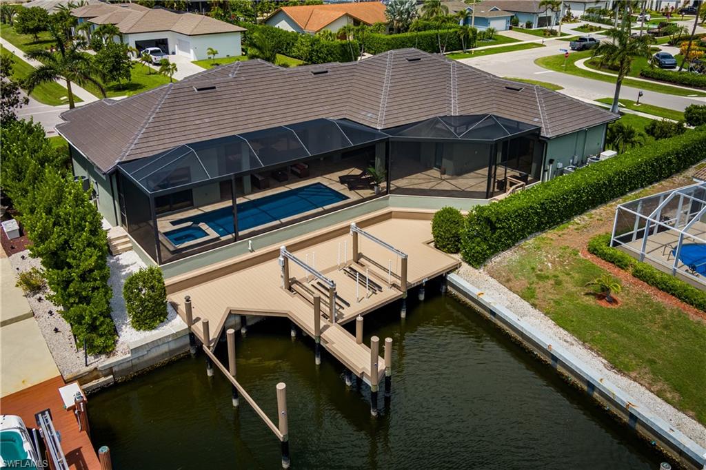 Aerial of dock and rear of home