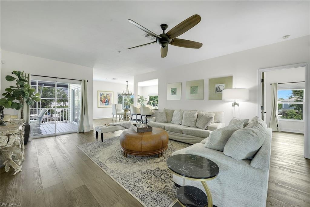 Overlooking the river, canal and the pool/lanai area, the great room is simply stunning - SO light and bright!
