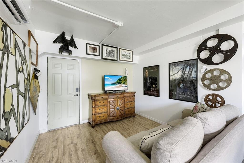Additional living space on lower level, currently being used at a media room.