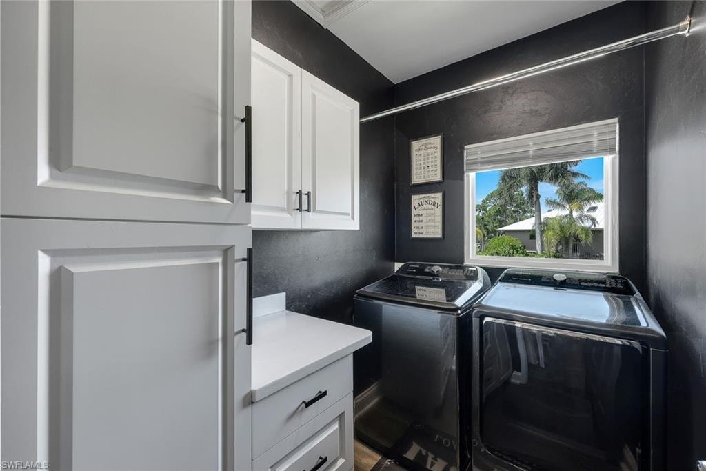 Large laundry room offers plenty of storage.