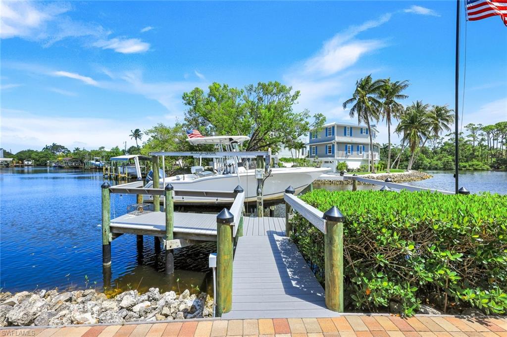Featuring a 10,000 pound boat lift.