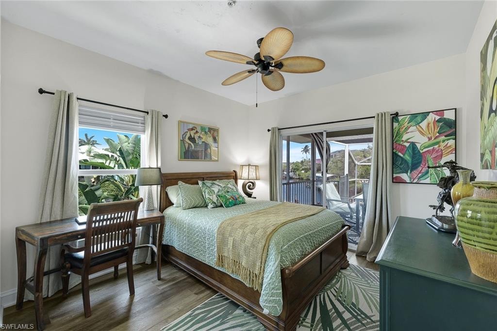 Guest bedroom offers access to the lanai and water views.
