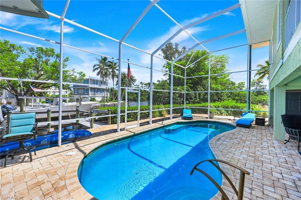 The pool area is expansive with so much space for lounging.