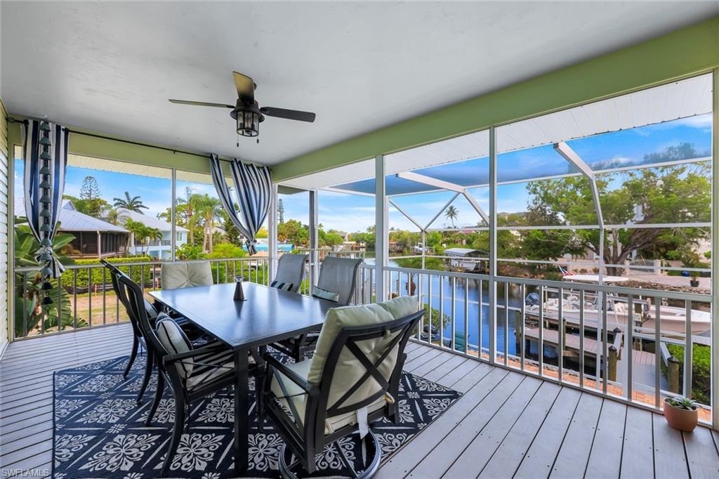 Florida living - waterfront views, sunshine, and a boat - dockside.