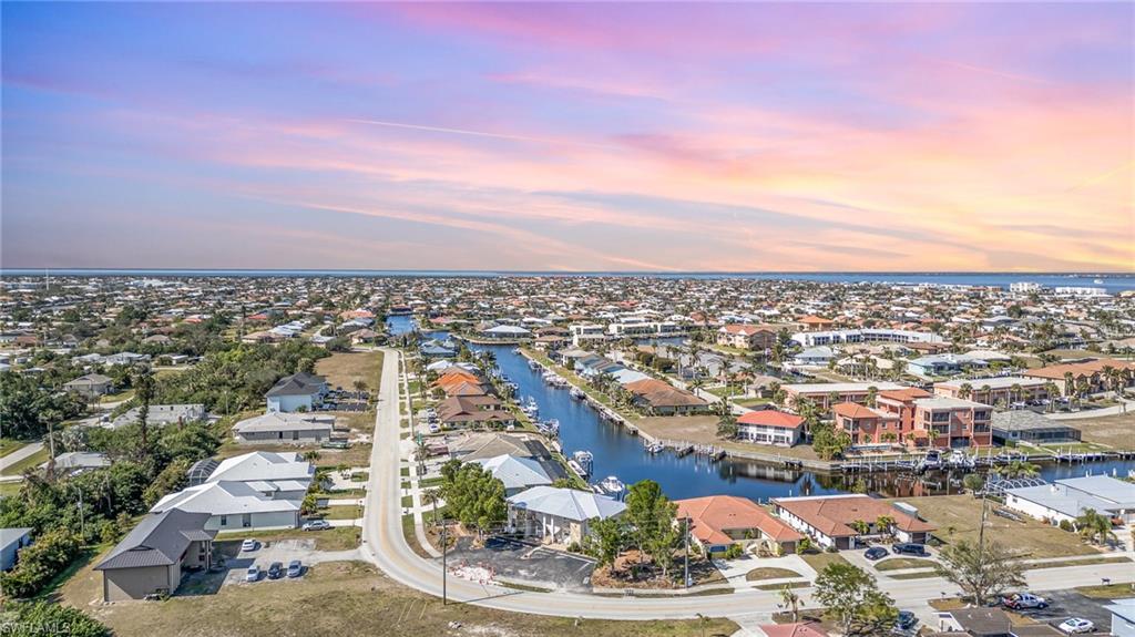 Aerial view of a coastal community featuring extensive canal systems