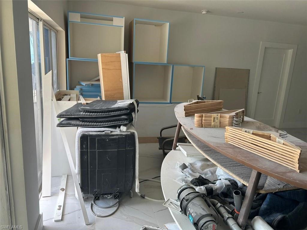 KITCHEN CABINETS AND SUPPLIES IN THE CONDO REMAIN.