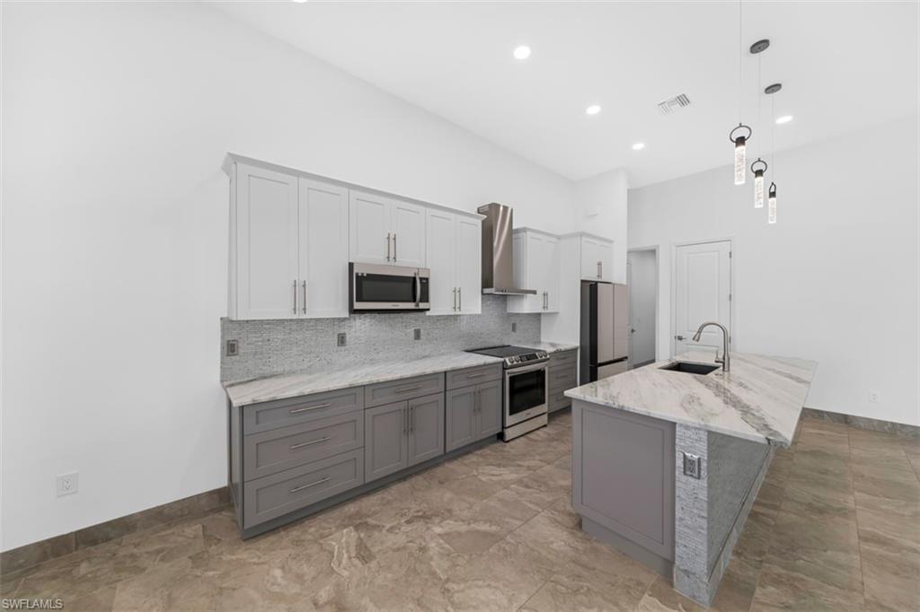 side of the kitchen, Samsung appliances with slide-in range
