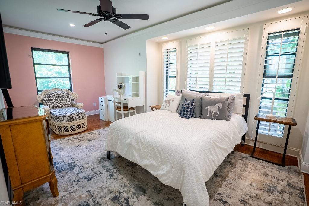 Interior space featuring wood-finish flooring, recessed lighting, and a ceiling fan