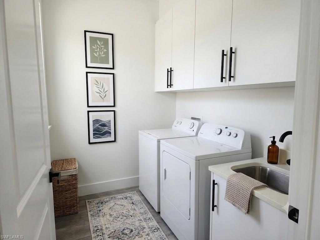 White shaker-style cabinetry with matte black hardware
