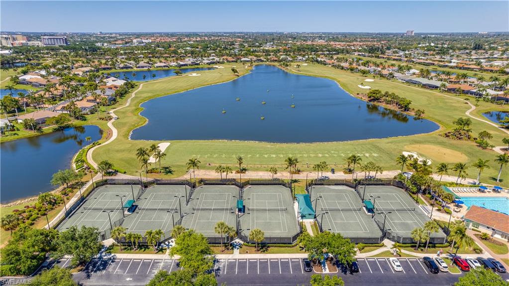 Aerial view of a golf club and a nearby body of water