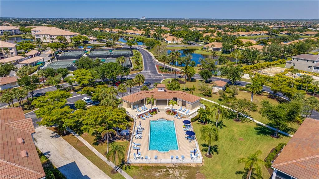 Bird's eye view of a pool area and a large body of water