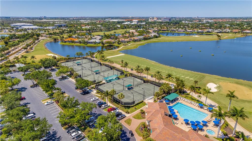 Bird's eye view of a nearby body of water and a golf club