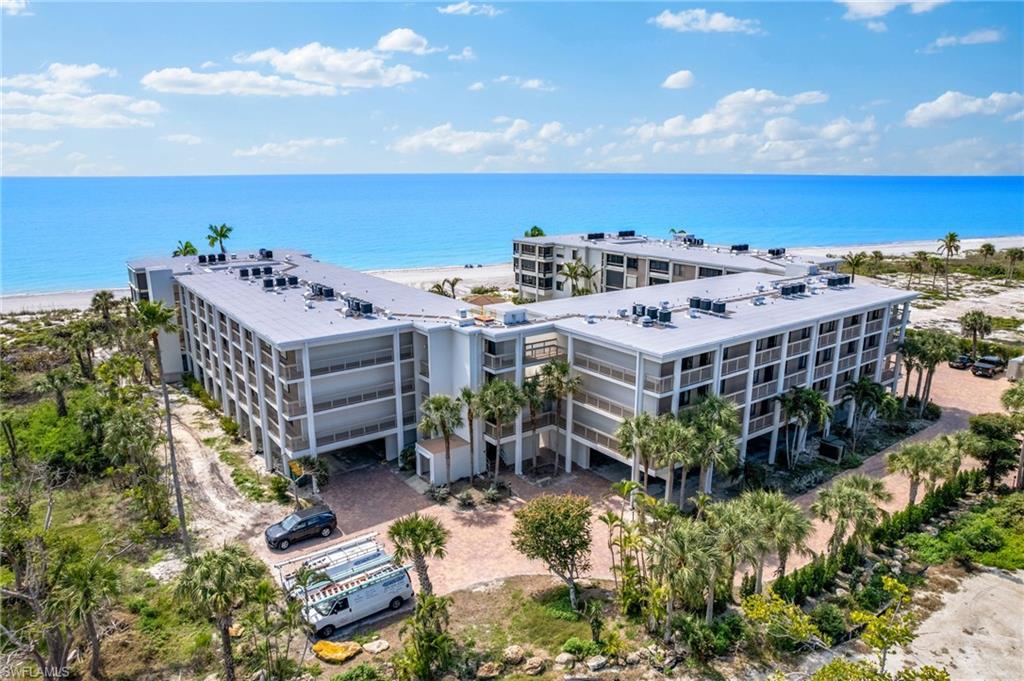 Aerial view of apartment complex / building and expansive beach