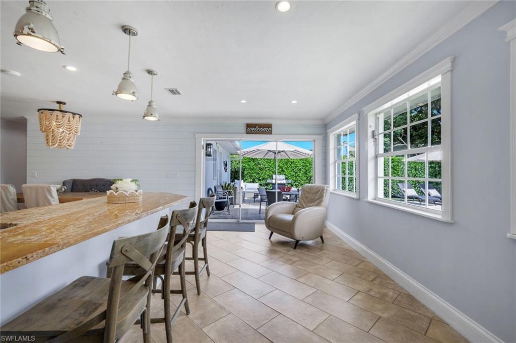 Kitchen Island & Area Leading to the Backyard