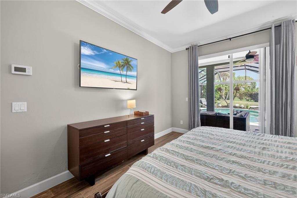 Primary Bed with Wood Plank Tile Floors