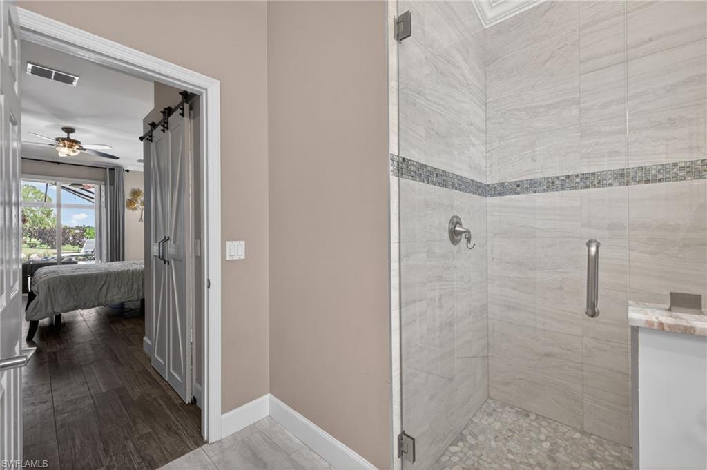 Primary Bath with Renovated Dual Vanities and an arched window