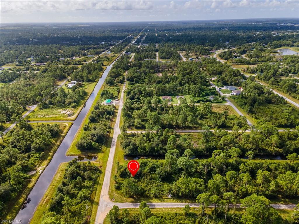 View of property location with a large body of water