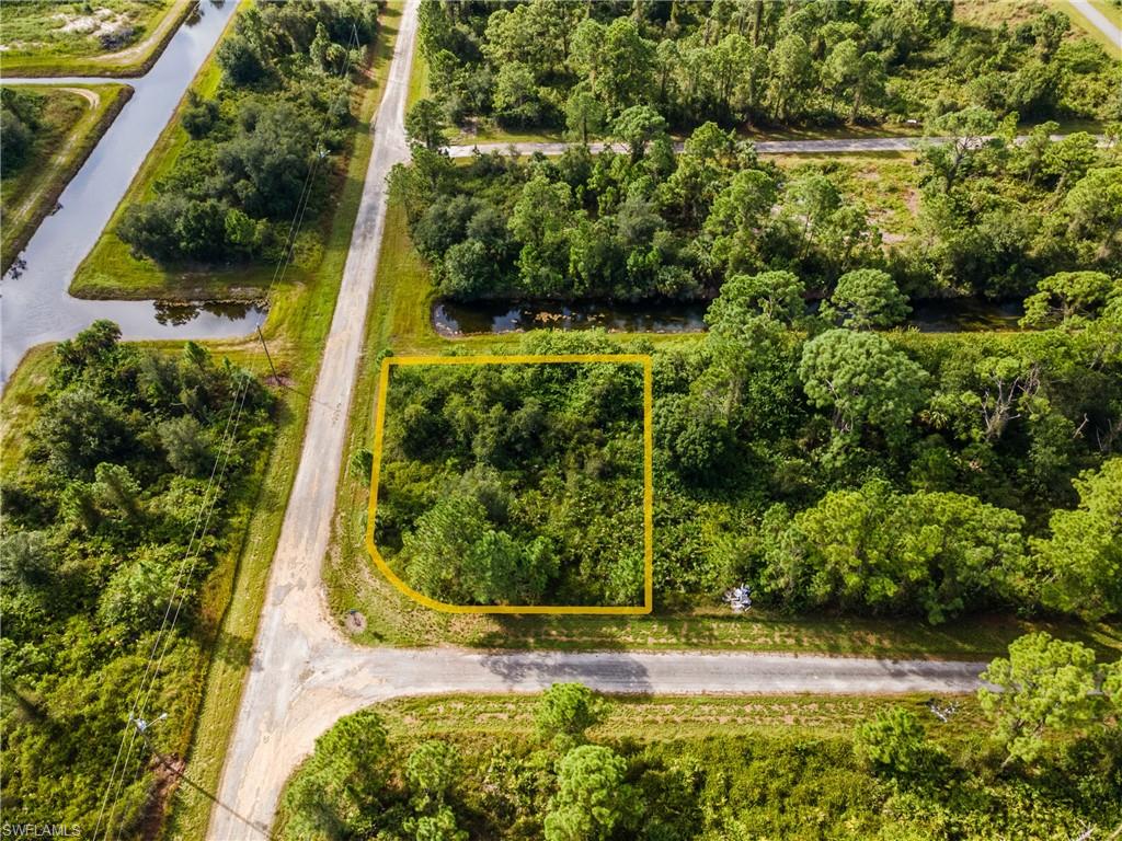 View of property location featuring property parcel outlined and a large body of water
