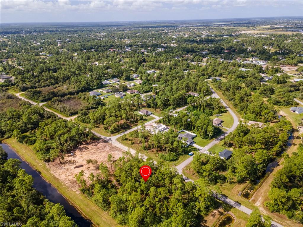 View of property location with a nearby body of water