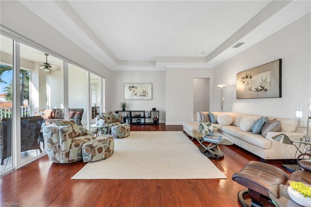 Expansive living room overlooks the screened lanai.