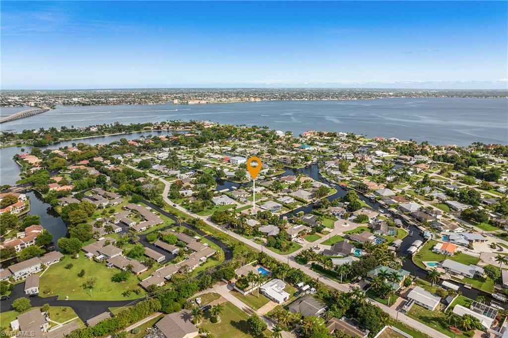 Aerial panorama showcasing a coastal community with extensive waterfront access