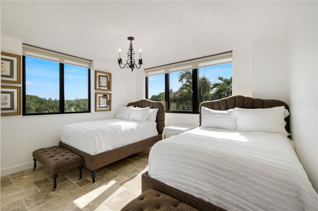 Guest Bedroom with two full size beds and ensuite