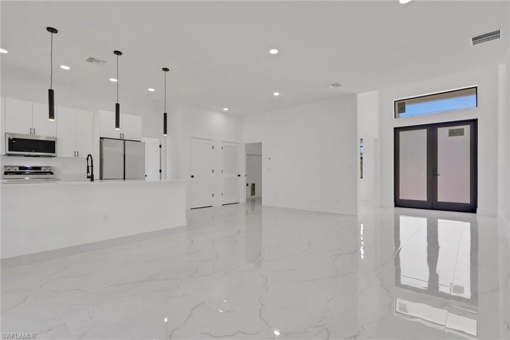 Living, dining, and kitchen