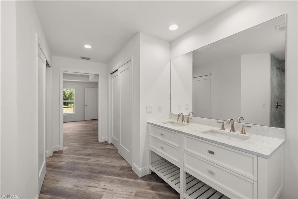 Dual closets with the larger walk in on the left side of the picture